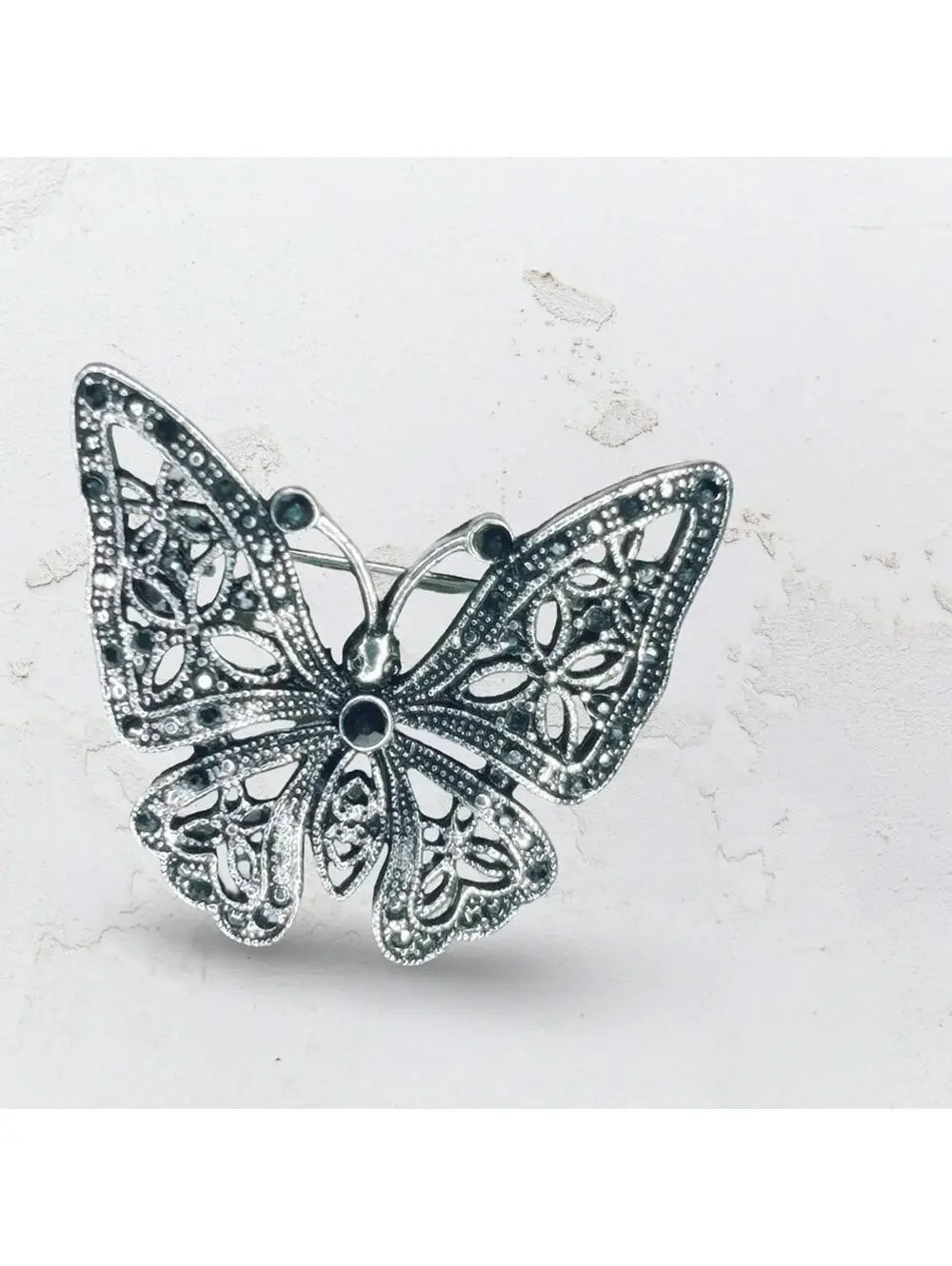 7260. Silvertone Insect Faux Marcasite Butterfly Brooch
